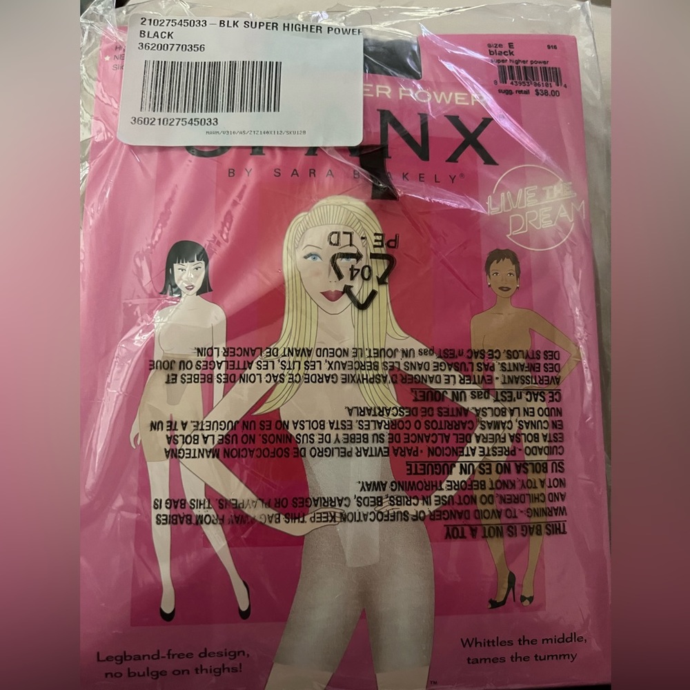 NEW in sealed package Black Spanx , size E